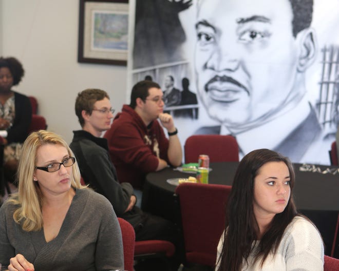 Students listen during a luncheon in remembrance of Rev. Martin Luther King Jr. on Wednesday.
