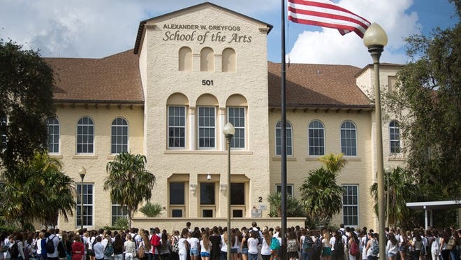 Students attend a memorial service on Tuesday, January 14, 2014, for Alexander Berman, 16, and Jacqueline Berman, 15, at the Alexander W. Dreyfoos School of the Arts which they both attended in West Palm Beach. Students shared memories and offered each other support. (Madeline Gray/The Palm Beach Post)