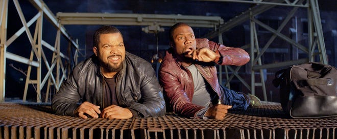 Ice Cube, left, and Kevin Hart in a scene from "Ride Along."