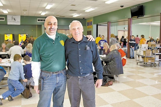 pic one: Michael Swenson, left, is chairing the annual pancake breakfast for the Wallkill East Rotary, with help from master pancake maker John Eagan.