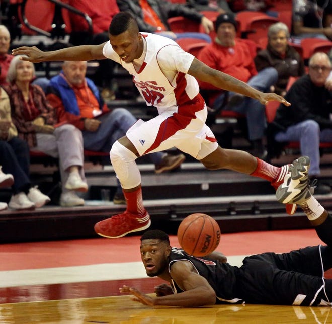 Florida Southern's Kevin Capers goes up for a basket against the Florida Tech.