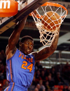 Florida forward Casey Prather (24) dunks against Auburn in the first half 
Saturday in Auburn, Ala. Prather, who was returning from a bruised knee, 
scored 21 points to lead the Gators past the Tigers. ASSOCIATED PRESS