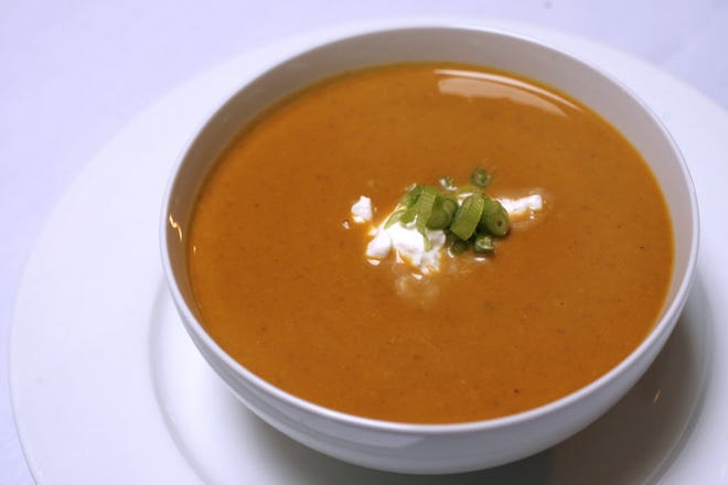 This pumpkin bisque is made with canned pumpkin puree and vegetable broth.