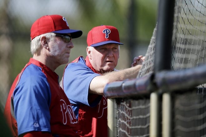 Philadelphia manager Charlie Manuel (right) talks with spring training instructor Mike Schmidt during a workout at spring training Thursday, February 21, 2013 in Clearwater, Fla.