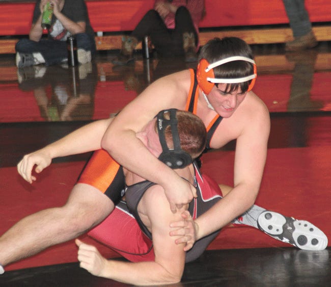 Jake Stevens of Sturgis works to pin Austin Rutz of Coldwater on Wednesday evening in their match.