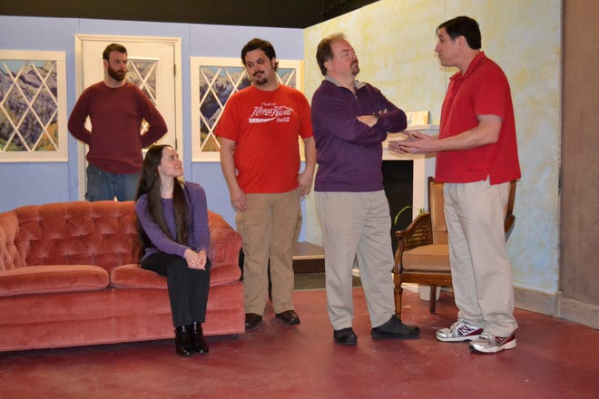 Pictured from left are Schuyler Van Tatenhove, Kira Sanscrainte, Jason Reimink, Michael Culp and Jim Griffin. Daniel Corbin (Griffin) tries to convince the police inspector (Culp) that the woman is not his wife in a rehearsal for "A Trap for a Lonely Man." Contributed