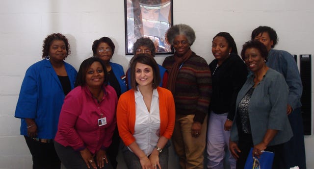The Lenoir/Greene Foster Grandparent Program participated in the Martin Luther King Day of Service Project. From first row left; Amy Washington (FGP Director), Laura Wilson (Special Education Instructor), and Jackie Rouse (Teacher); from second row left, Diane Simms (Foster Grandparent), Mary Corbitt (Foster Grandparent), Essie Yelverton (Foster Grandparent), Berle Taylor (Teacher Assistant), Semeria Byner (Teacher Assistant), and Hosea Jones (Teacher Assistant) represent the program by providing lunch (pizza and drinks) for Snow Hill Primary School Exceptional Children classes as its Day of Service project. For more information on the program, call Amy Washington, Foster Grandparent Program Director, Caswell Developmental Center, at 252-208-3779.