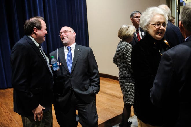 Scott Dalrymple, center, then dean of the School of Liberal Arts at Excelsior College in Albany, N.Y., and finalist in the presidential search at Columbia College, greets guests before an open forum Monday, Jan. 13, at Bixby Lecture Hall at the college. Dalrymple was later selected from two finalists to be Columbia College’s 17th president.