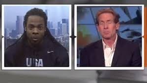 Seattle Seahawks CB Richard Sherman (L) takes on ESPN commentator Skip Bayless (R), calling Bayless a "cretin," in a March 2013 broadcast of the show "First Take."