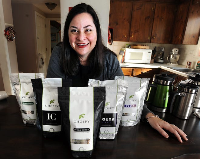 Maura Stearns of Milford is an independent distributor of Choffy, a brewed, unsweetened chocolate drink made from 100 percent roasted and ground premium cacao beans. Daily News Staff Photo / Allan Jung