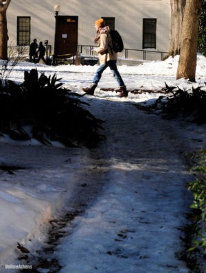 Snow covers the North Campus area as classes at the University of Georgia resume and more downtown businesses open on Thursday, Jan. 13, 2011. (David Tulis/Staff/david.tulis@onlineathens.com) Athens Banner-Herald/OnlineAthen
