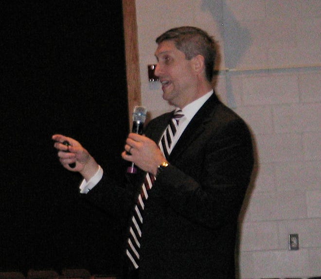 IVC Superintendent Chad Allison speaks to the crowd at the State of the District breakfast Saturday.