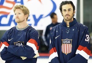 Paul Martin and Ryan Miller | Photo Credits: Bruce Bennett/Getty Images