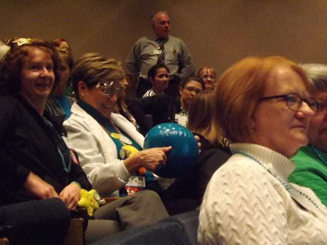 Employees at Stormont-Vail HealthCare celebrated earning a prestigious nursing designation Tuesday morning with beads, novelty glasses and beach balls. The magnet designation showed they exceeded standards for care and innovation.