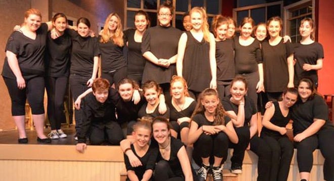 Photo courtesy of seansmithphotos.com. 

AIR teens and Susan Lamontagne pose during a dress rehearsal, Divas at the Mic, in 2013.