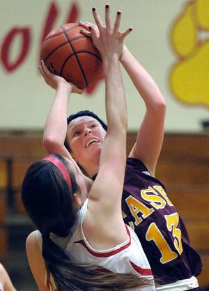 Case's Ellie Roberts shoots past Bishop Connolly's Jess Fournier during Thursday's game.