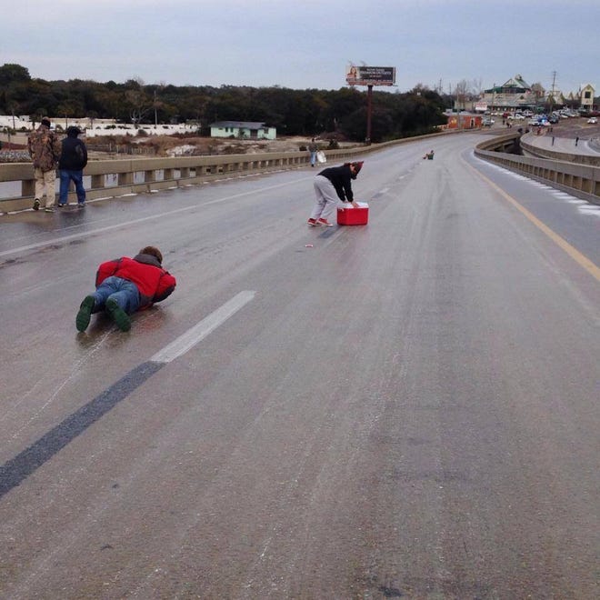 Destinites got creative on the Destin bridge with bobsleds made from coolers and laundry baskets.