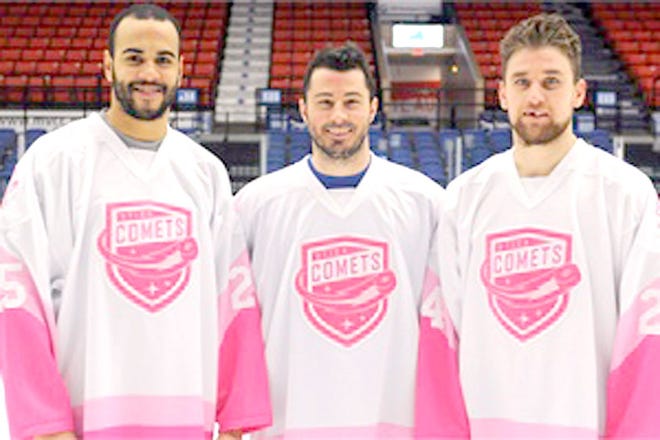 Utica Comets players model the jerseys they will be wearing for Friday’s Pink the Rink Game against Syracuse.



Photo Courtesy of Utica Comets