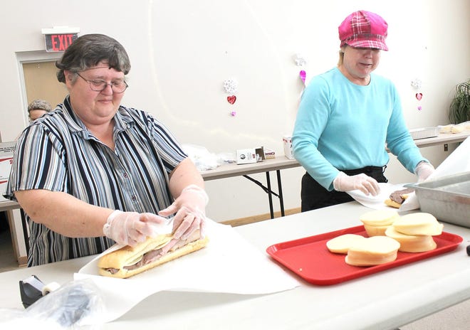Jean Nickels (left) and Linda Jarvis make Super Bowl Subs at Perennial Park Senior Center Thursday afternoon with other volunteers for Sunday's football game. The sub sandwich sale is an annual fundraiser for the center. This year 518 sandwiches have been sold. Sandwiches can still be purchased until 5 p.m. today and from 10 a.m. to noon Saturday for $7. Sandwiches feature turkey, ham, roast beef and provolone cheese. Sandwiches can be picked up until 5 p.m. today and from 10 a.m. to noon Saturday.
