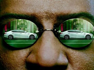 This undated frame grab provided by Kia shows the company's 2014 Super Bowl commercial. The third-quarter ad to introduce its K900 luxury sedan, features Laurence Fishburne reprising his "Matrix" role as Morpheus and displays some surprising operatic skills.