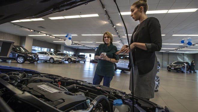 Laura Black, right, of First Texas Honda in Austin speaks with customer Susann Horton on Wednesday, Jan. 29. Susann Horton recently purchased a vehicle from First Texas Honda and was back to look at cars for one of daughters.RICARDO B. BRAZZIELL / AMERICAN- STATESMAN)
