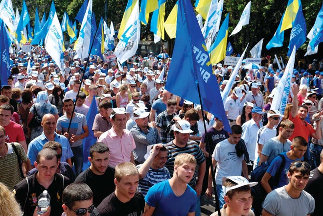 Thousands of Ukrainians marched toward Kiev's city center in a government opposition rally last May. Many Ukrainians are fed up with the country's widespread corruption.