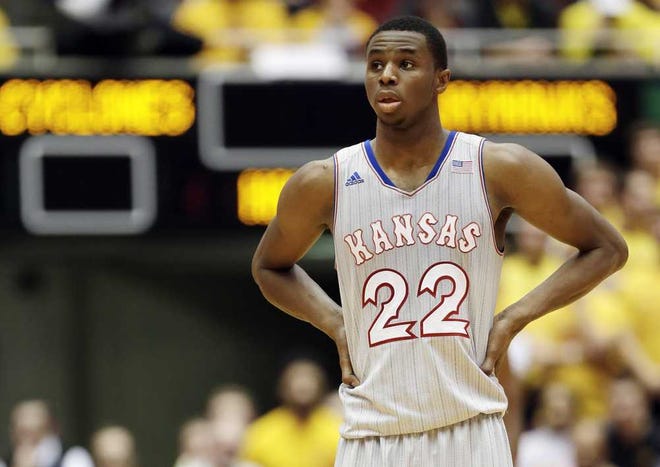 FILE - In this Jan. 13, 2014, file photo, Kansas guard Andrew Wiggins looks on during a break in the second half of an NCAA college basketball game against Iowa State in Ames, Iowa. Just imagine how much criticism Wiggins would be getting if No. 8 Kansas was losing. The Jayhawks have reeled off five straight wins despite their star freshman going through the typical freshman struggles. (AP Photo/Charlie Neibergall, File)