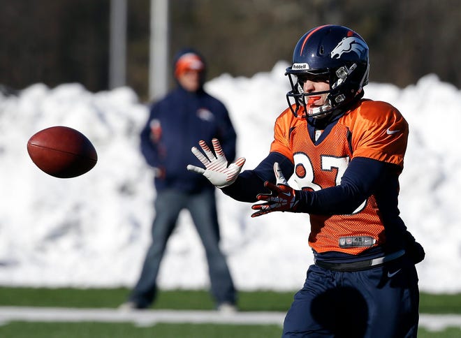 Denver Broncos wide receiver Wes Welker (83) catches a pass during practice Wednesday in Florham Park, N.J. (AP Photo/Mark Humphrey)