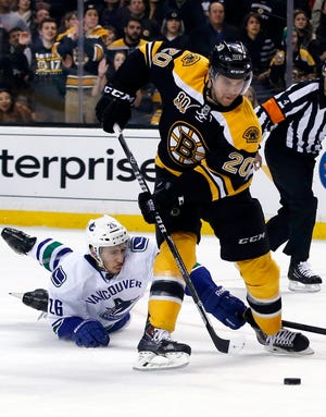 Bruins forward Daniel Paille shoots and scores on a breakaway during the second period of Boston's 3-1 win Tuesday night.