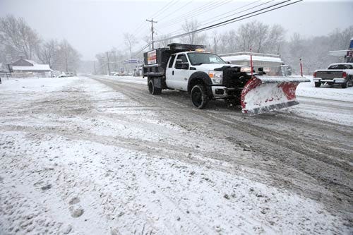 Photo by Daniel Freel/New Jersey Herald - A snow plow travels along State Route 94 in Blairstown Monday, February 3, 2014.