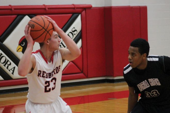 Metamora senior Ben Russell looks for an open player against Central in a previous game.
