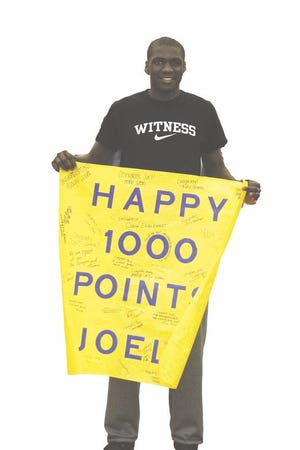 Blue Devil senior Joel Zola had a career milestone Friday in the Big Spring game. With his 10th point he surpassed 1,000 for his G-A career. The G-AHS student section honored Zola with a banner after the game.
