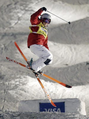In this Jan. 11, 2014 file photo, Hannah Kearney competes during the women's freestyle World Cup moguls event in Park City, Utah.