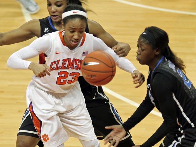 Clemson's Chancie Dunn, center, loses control of the ball between Duke's Kendall McCravey-Cooper, back left, and Alexia Jones, right, in the second half on Thursday in Clemson.