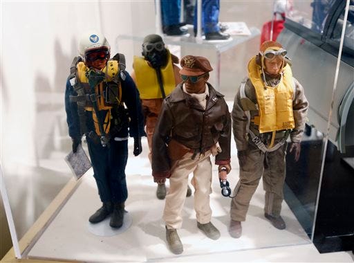 Tuskegee Airmen G.I. Joe action figures in a display at the New York State Military Museum in Saratoga Springs, N.Y. A half-century after the 12-inch doll was introduced at a New York City toy fair, the iconic action figure is being celebrated by collectors with a display at the military museum, while the toy's maker plans other anniversary events to be announced later this month.