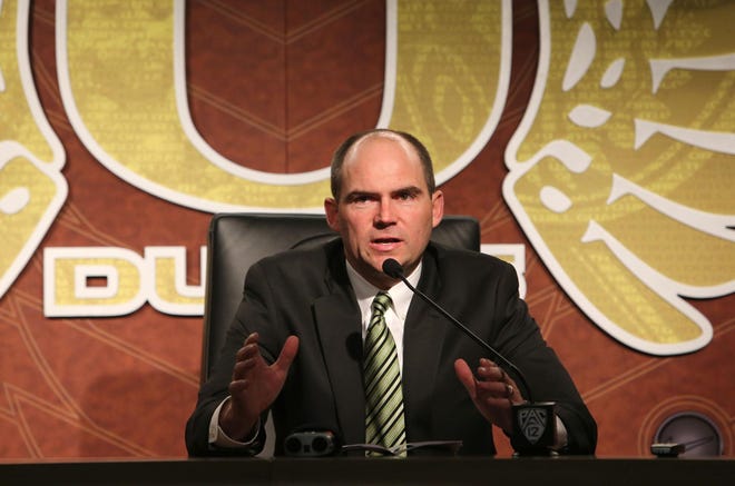 Mark Helfrich speaks during a press conference at the Football Performance Center at the University of Oregon in Eugene, Ore. Wednesday, February 5, 2014. (Brian Davies/The Register-Guard)