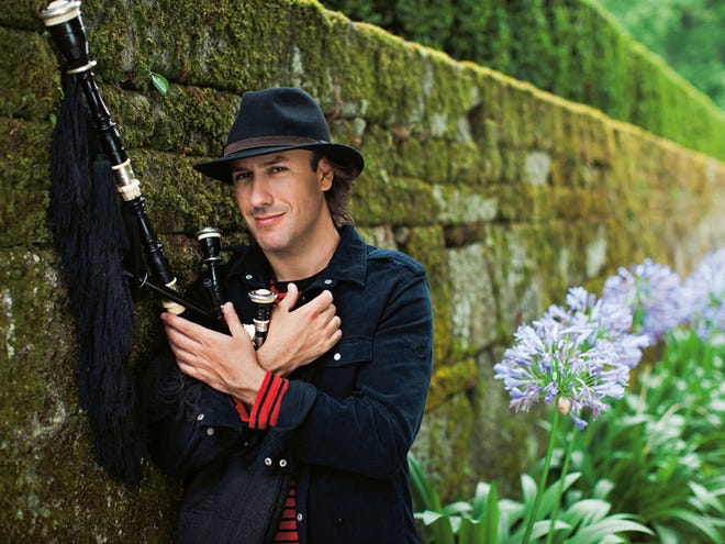 Spanish pipes player Carlos Núñez performs Friday at the University Auditorium.