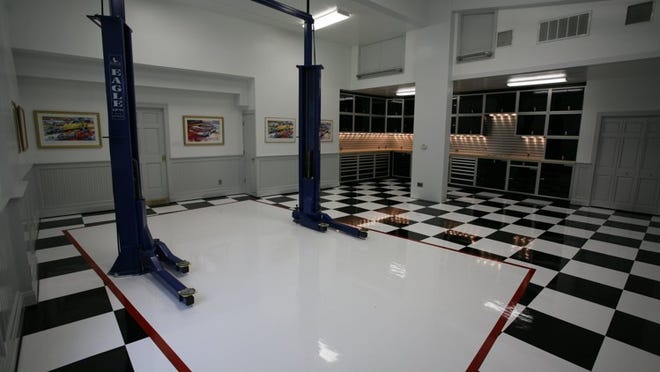 Joe Raymond, 51, of Blanco said it took about three days to paint the checkerboard floor of his 900-square-foot two-car attached garage and that it’s much easier to keep clean now.