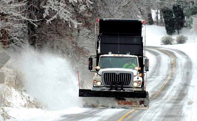When a snowplow clears a roadway, the heavy snow can land on or knock down mailboxes.