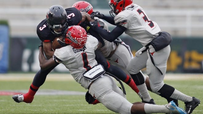 Lake Travis running back Shaun Nixon (3), a four-star prospect, who had been committed to Texas A&M since November, made a surprising switch to TCU this week, becoming one of the Horned Frogs’ top-rated recruits.