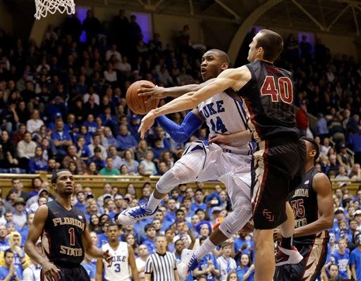 Duke’s Rasheed Sulaimon takes off on a drive as Florida State’s Brandon Allen defends during a recent game.