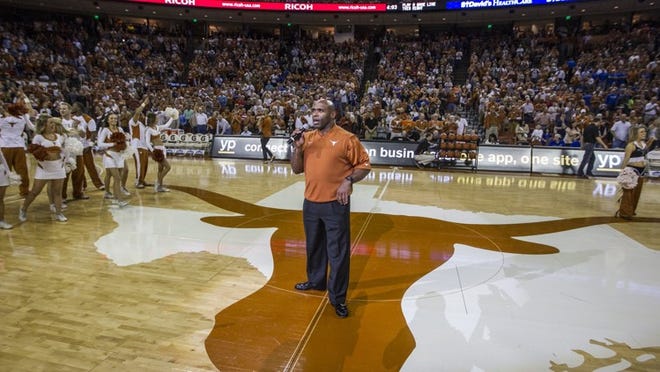 Coach Charlie Strong — the center of Longhorn fans’ attention at halftime of the Feb. 1 basketball game against Kansas at the Erwin Center — brings a focus on football and academics to his new job at Texas.
