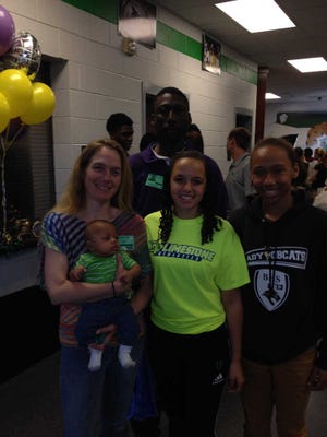 Jack Cavanaugh/Bluffton Today Kativa Stout, center, will play soccer at Limestone. She poses with her mother Jennifer Gadson, father Robert Gadson, brother Tae'von Gadson and sister Jaelyn Gadson.