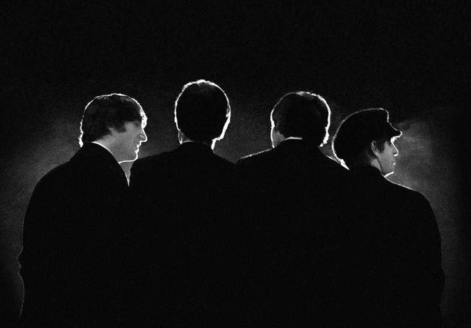 The Beatles at a Feb. 11, 1964, concert in Washington. Illustrates BEATLES (category e), by Lavanya Ramanathan (c) 2014, The Washington Post. Moved Friday, Feb. 7, 2014. (MUST CREDIT: Mike Mitchell)