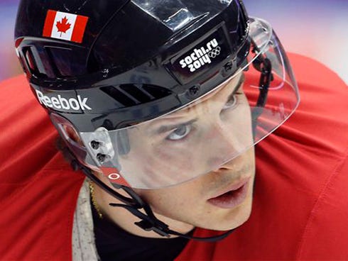 Canada forward Sidney Crosby waits for a pass during a training session at the 2014 Winter Olympics Monday in Sochi, Russia.