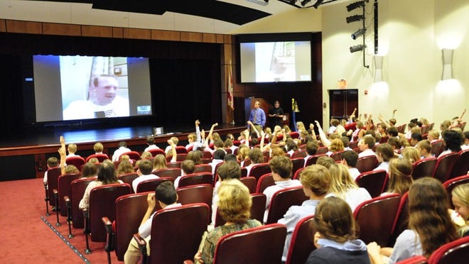 American biathlete Lowell Bailey talks to Palm Beach Day Academy students from Sochi, Russia, via Skype, where he is participating in biathlon -- cross-country skiing and shooting.