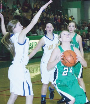 Wethersfield’s Kristen Parsons (24) rises for two of her game-high 31 points Monday night against Galva.