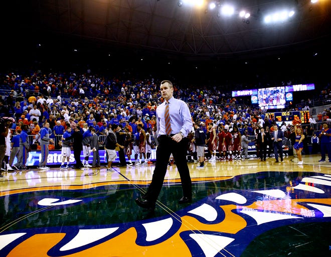 Florida coach Billy Donovan walks off the court after the second half against the Alabama Crimson Tide at the O'Connell Center on Saturday. Florida defeated Alabama 78-69.