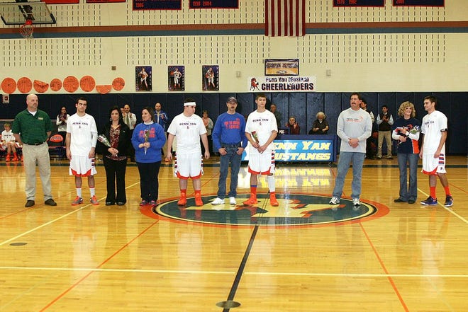 The Penn Yan Varsity senior boys from the basketball team. From Left are Bradley Voigt, Shawn Peck, Cody Button, and Shane Bloom with their parents.