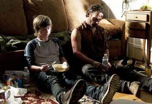 Chandler Riggs and Andrew Lincoln | Photo Credits: Gene Page/AMC